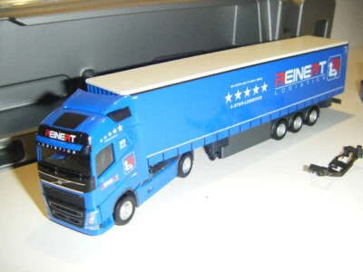 Herpa 308465 VOLVO FH GL Reinert mit Mitnahmestapler - Bild 1 von 4