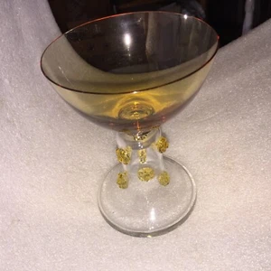 GOLD GLASS WITH CLEAR GLASS, SMALL YELLOW FLOWERED BASE DESIGN CHAMPAGNE GLASS - Picture 1 of 5