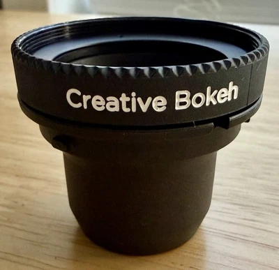 Lensbaby Creative Bokeh Doble Vidrio Parte del Sistema de Intercambio Óptico con Insertos Foto 1 de 4