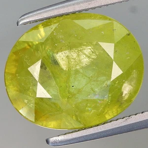 Esfena verde amarillento natural ovalada 3,09 quilates ancho 10,6 x 8,6 mm Madagascar, África - Imagen 1 de 4