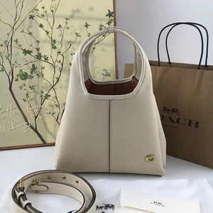 Bolso de hombro COACH Lana de cuero granulado pulido 23 bolsos de mano para mujer marfil - Imagen 1 de 6