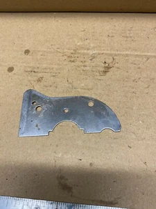 Pre-owned Side plate from a Homelite XL, No 10618 1.6 CID,14" chainsaw - Bild 1 von 2