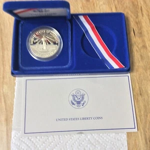 1986 S Ellis Island Proof Silver Dollar w/ OGP and COA - Picture 1 of 3
