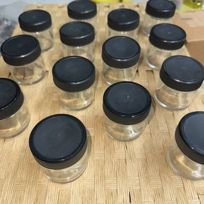 1 Oz. Straight Side Glass Jar With Black Plastic Cap. 14 Count - Image 1 of 4