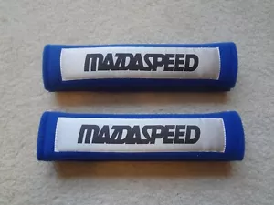 2x New Blue Car Seat Belt Cover Shoulder Pads labeled "Mazdaspeed" - Picture 1 of 1