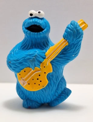 Figura de juguete Cookie Monster tocando guitarra Sesame Street Muppets Inc PVC 1982 DE COLECCIÓN Foto 1 de 4