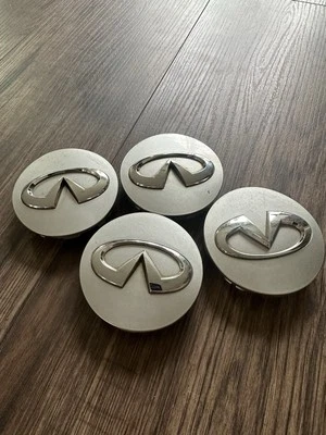 4 P 2011-2014 Infiniti QX56 / QX80 # 73727 20" Wheel Center Cap OEM # 403421LB4A - Image 1 of 4