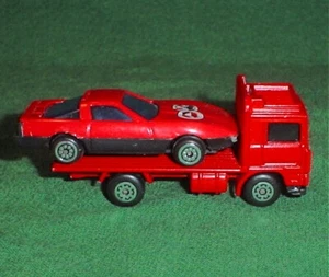 MATCHBOX 1981 VOLVO FLACHBETT LKW AUTO SCHLEPPER, 1:90, VIBRIEREND ROT, MAKELLOS - Bild 1 von 6