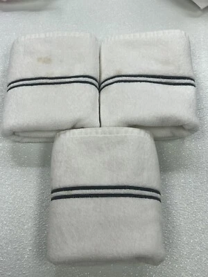 Juego clásico de 3 toallas de mano Frette Hotel blancas/carbón usadas con defectos Foto 1 de 4