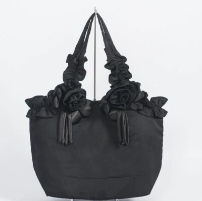 HERMOSO BOLSO DE MANO NEGRO O MORADO CON ROSAS SATINADAS DISPONIBLE EN 2 TELAS Foto 1 de 2