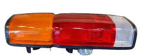 TYC Left Tail Light Assembly - 11-1682-01 / 26526-01G00 - Fits Nissan PU & D21 - Picture 1 of 7