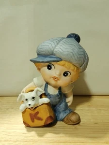Homco Porcelain Figurine 1439 Little Boy with Dog in Bag 5" - Picture 1 of 4