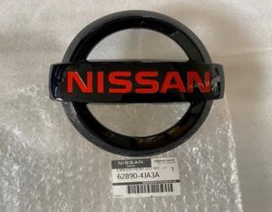 NISSAN NAVARA 2016-24 NP300 D23 PRO 4X GENUINE BLACK GRILLE EMBLEM 628904JA3A - Picture 1 of 6