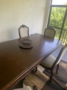 Large solid wood dinning room table chairs Included *PRICES NEGOTIABLE - Picture 1 of 8