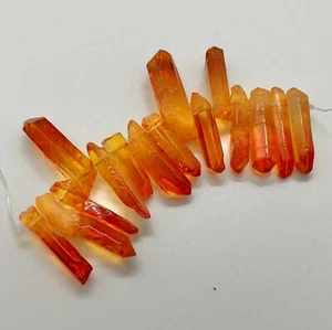 Quartz crystal, Orange/Red,15x4mm-34x12mm hand-cut. 4-inch strand. 10-15 beads. - Picture 1 of 1