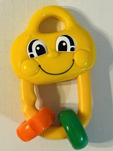 Fisher Price Mattel 2002 Kunststoff gelb Schlüssel Rassel Beißring Smiley Gesicht 5 Zoll - Bild 1 von 2