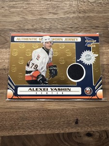2003-04 Pacific Prism Gold Authentic Game Worn Jersey Alexi Yashin  #129