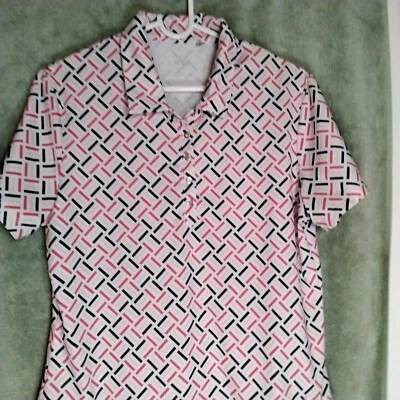 Polo deportivo Nivo para mujer talla M rosa negro geométrico a presión manga corta Foto 1 de 4