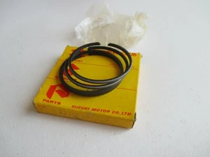 NOS SUZUKI M15 M15D M12 GENUINE PISTON RINGS 1.00mm OVERSIZE 12140-09829 - Picture 1 of 2