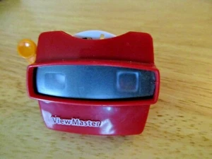 World Smallest Fisher Price View Master (5015) 2" x 1,25" x 1,5" con 1 diapositiva - Imagen 1 de 4