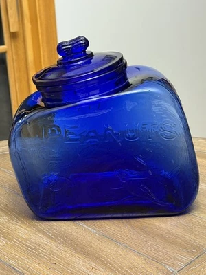 Banderín vintage de cacahuetes salados jardineras cacahuetes azul cobalto frasco de vidrio Foto 1 de 4