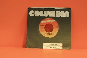 BARBRA STREISAND - WOMAN IN LOVE (WITH JUKE STRIP)  7" VINYL SINGLE 45 S - Picture 1 of 2