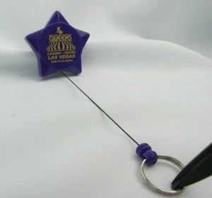 Four Queens Casino Hotel Las Vegas Retractable Key Chain with Clip Purple Star - Picture 1 of 3