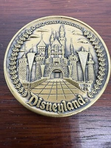 Vintage Disneyland 4 Lands Coin - Picture 1 of 9