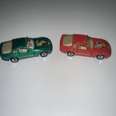 Спичечный коробок 1987 (2) Porsche 944 Turbo красный и металлический зеленый винтажный - Изображение 1 из 4