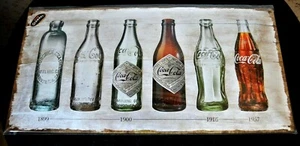 Nostalgic Art, Blechschild COCA COLA - BOTTLE TIMELINE, 25 x 50, Neu - Picture 1 of 1