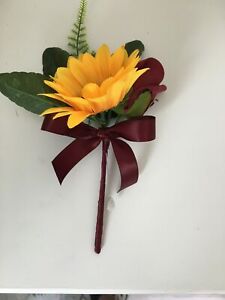 burgundy rose and sunflower double buttonhole