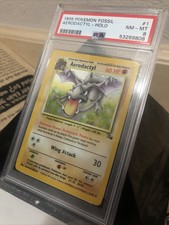 PSA 8 - Aerodactyl - Holo - Fossil Unlimited -1/62 English 1999 Pokemon NM-MT