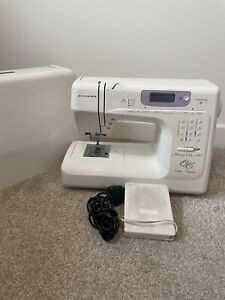Janome Memory Craft 4800 Sewing Machine hardly used, runs really well