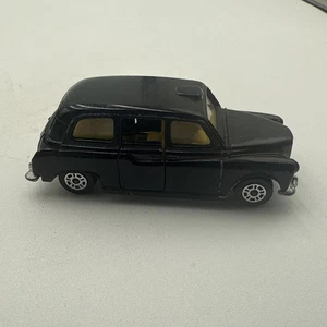 VINTAGE CORGI TOYS BLACK LONDON TAXI CAB DIECAST CAR - Picture 1 of 10