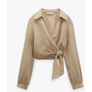 Camisa corta Zara para mujer talla pequeña de lino atado manga larga envolvente tostada - Imagen 1 de 10