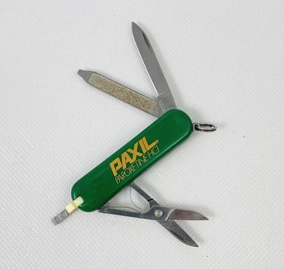 🌟Navaja de bolsillo Victorinox Classic SD 58mm Swiss Army, anuncio Paxil Pharma Foto 1 de 4