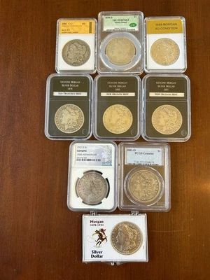 9 dólares Morgan en losa 1882CC, 1879-S, 1880-O, 1881-O, 1883-O, 1889-S, 1888, 1 Foto 1 de 2