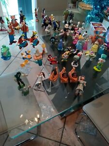 Disney Movies Lot Of 59 Assorted Figures. Various Sizes includes pirate mickey
