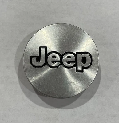 Tapacubos central Jeep Grand Cherokee 2000 OEM 5CF 97 TRM Foto 1 de 4