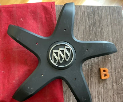 #B (1) BUICK Cascada OEM FACTORY Center Cap HOL# 4145 MATTE BLACK 13361804 - Image 1 of 4