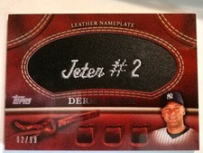 2011 TOPPS Black GLOVE MANUFACTURED LEATHER NAMEPLATE DEREK JETER serial #62/99