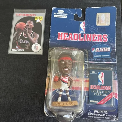 TARJETA DE NOVATO OFICIAL NBA HOOPS CLIFF ROBINSON Y ESTATUA COLECCIONABLE DE CABEZAS DE CARTEL Foto 1 de 4