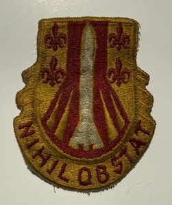 Patch Insegna 557° Gruppo Artiglieria US Army - NIHIL OSTAT - Foto 1 di 4