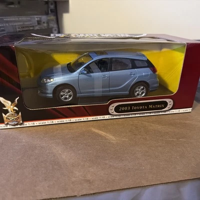 1/18 YAT MING 2003 TOYOTA MATRIX RED ROAD SIGNATURES - Image 1 of 4
