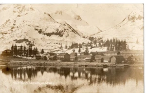B14-80707  ca 1915 RPPC Photo Postcard Port Liecum (?) Alaska old wood buildings - Picture 1 of 2