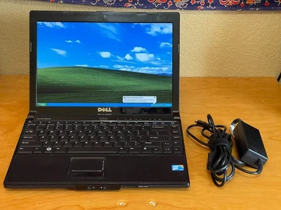 Dell Inspiron 1318 13" Windows XP Laptop (Core 2 Duo, Firewire, DVD, 4GB, 160GB) - Image 1 of 4