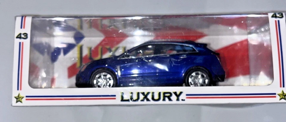 LUXURY COLLECTIBLES 1/43 CADILLAC 2011 SRX CROSSOVER Imperial Blue Car 100952 - Image 1 of 4