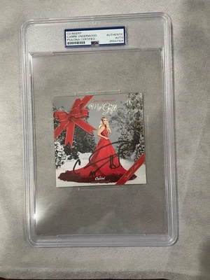 Carrie Underwood “My Gift” Autographed Insert PSA slabbed - Image 1 of 2