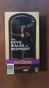 THE DEVIL WALKS AT MIDNIGHT (VHS) ERIKA BLANC , JEAN SERVAIS - Picture 1 of 2