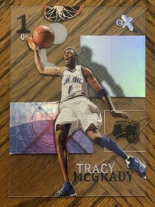 2003-04 E-X #40 Tracy McGrady Orlando Magic Toronto Raptors Acetate - Picture 1 of 2